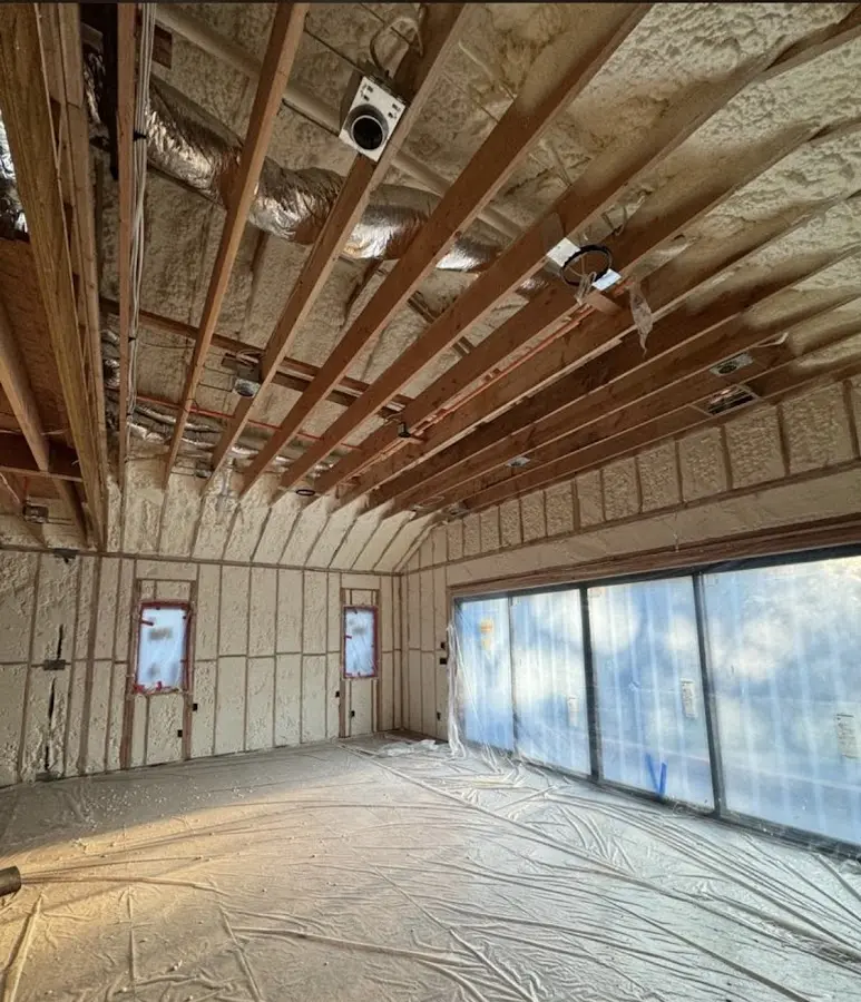 Interior walls and ceiling insulated with spray foam during new construction in Munhall